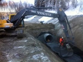 Graving med gravemaskin